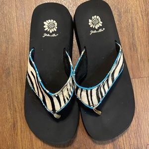 Yellow Box Flip Flops. Color: zebra print, blue border, black soles. Size 10